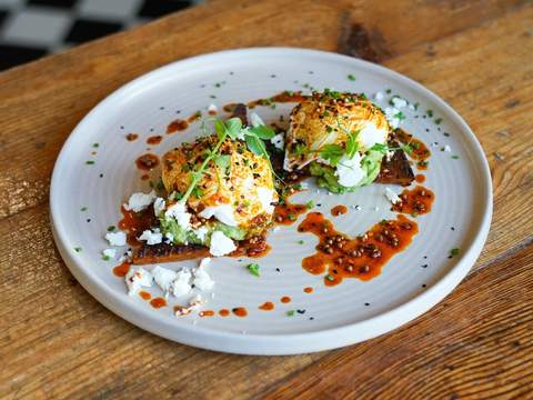 A Fiery Benedict on a white plate